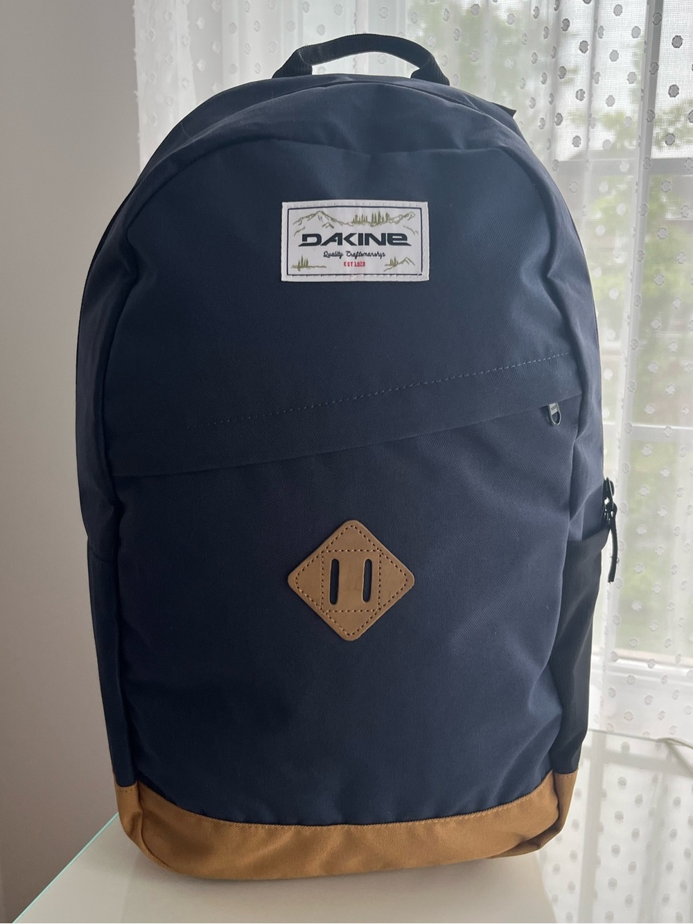 Dakine Navy and Tan Classic Switch 21L Backpack in the Bozeman Color